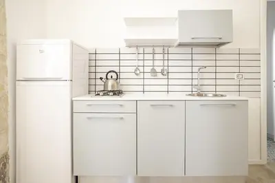 Cucina o angolo cottura di Mirabella Apartment in Ortigia by Wonderful Italy