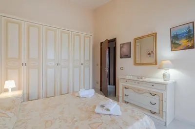 Letto o letti in una camera di Villa Fratelli