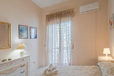 Letto o letti in una camera di Villa Fratelli