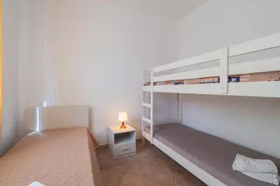 Letto o letti in una camera di Villa Fratelli