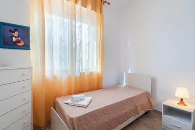 Letto o letti in una camera di Villa Fratelli
