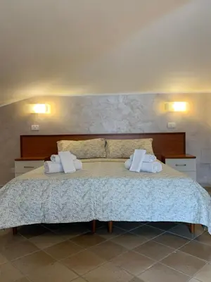 Letto o letti in una camera di LaIonica