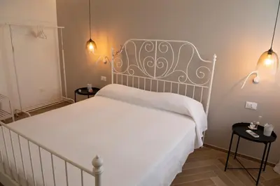 Letto o letti in una camera di Chiocciola Apartment sul lungomare tremoli, parcheggio gratuito