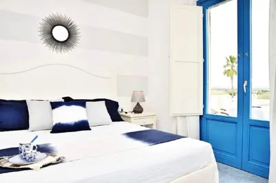 Letto o letti in una camera di Appartamento Borgo Rio Favara