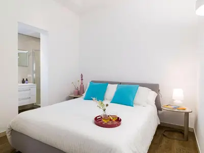 Letto o letti in una camera di Villa San Lorenzo Beach