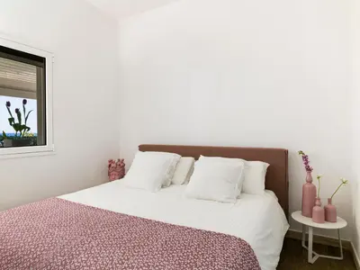 Letto o letti in una camera di Villa San Lorenzo Beach
