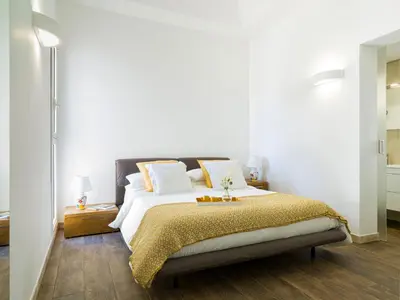 Letto o letti in una camera di Villa San Lorenzo Beach