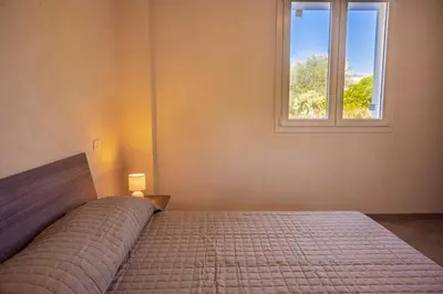 Letto o letti in una camera di La Casa del Gelsomino tra Noto e Mare