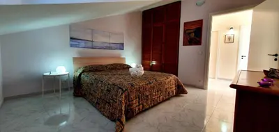 Letto o letti in una camera di Chicca House