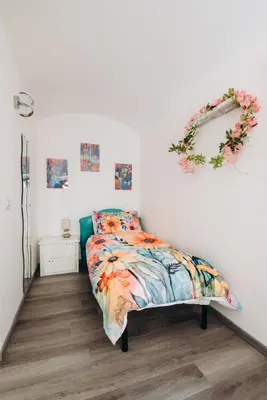 Letto o letti in una camera di Castle Living