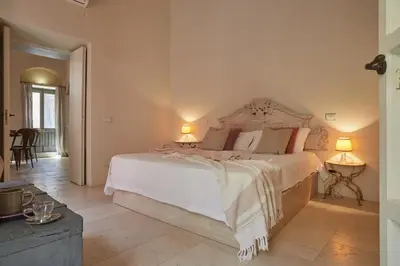 Letto o letti in una camera di Dammuso Neas Noto
