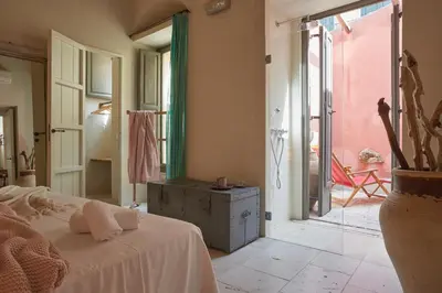 Letto o letti in una camera di Dammuso Neas Noto