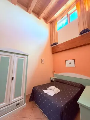 Letto o letti in una camera di Hotel Archimede Ortigia
