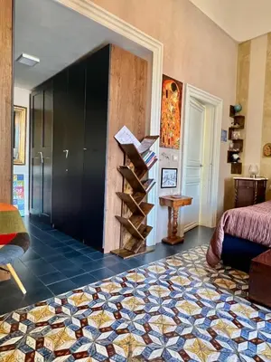 Letto o letti in una camera di Palazzo Zappata luxury room Noto centro