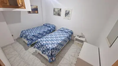 Letto o letti in una camera di Casa Marina Marzamemi