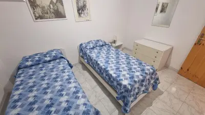 Letto o letti in una camera di Casa Marina Marzamemi