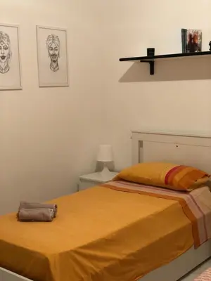 Letto o letti in una camera di Casa Vacanza Santa Maria del Focallo