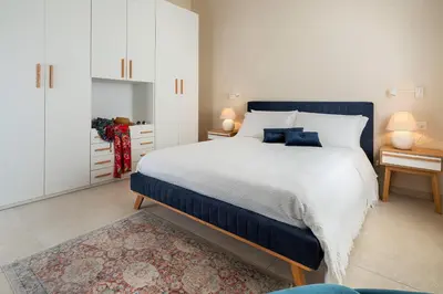 Letto o letti in una camera di Villa Mora