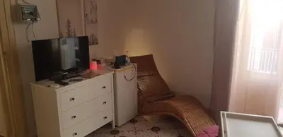 TV o dispositivi per l'intrattenimento presso HomeholidayinSicily - Room ovest