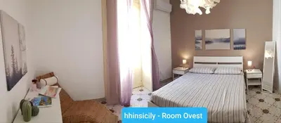 Letto o letti in una camera di HomeholidayinSicily - Room ovest