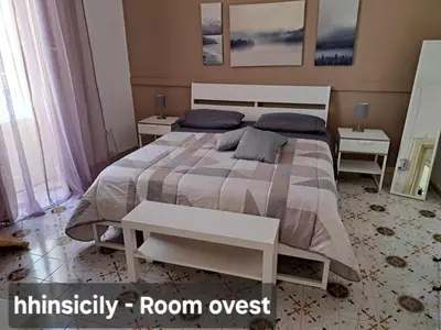 Letto o letti in una camera di HomeholidayinSicily - Room ovest