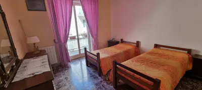 Letto o letti in una camera di Casa Lucia