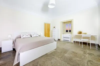 Letto o letti in una camera di Villa Polara