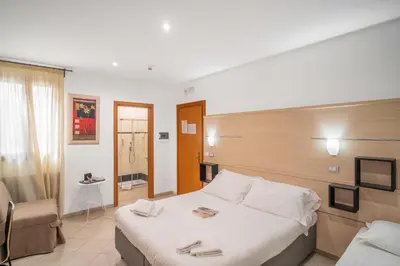 Letto o letti in una camera di Hotel Centrale