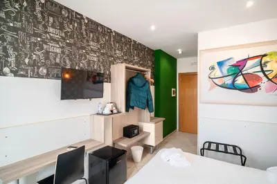 Letto o letti in una camera di Hotel Centrale