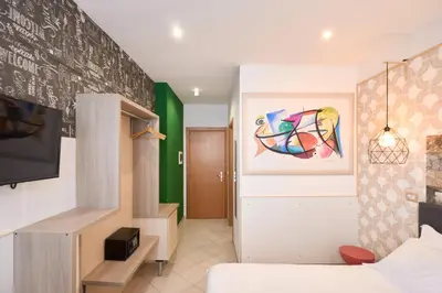 Letto o letti in una camera di Hotel Centrale