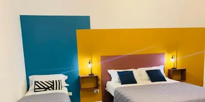 Letto o letti in una camera di Dimora Lupo_LifeStyle B&B