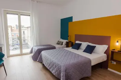 Letto o letti in una camera di Dimora Lupo_LifeStyle B&B