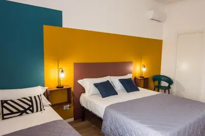 Letto o letti in una camera di Dimora Lupo_LifeStyle B&B
