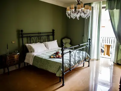 Letto o letti in una camera di B&B Principe Augusta
