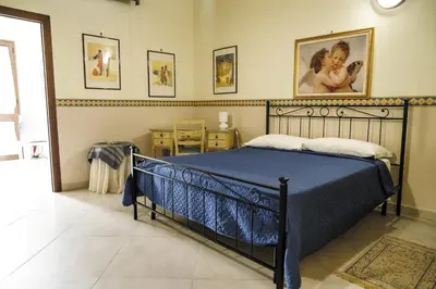 Letto o letti in una camera di B&B Principe Augusta