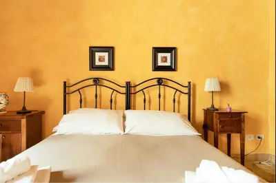 Letto o letti in una camera di Garconniere in Ortigia