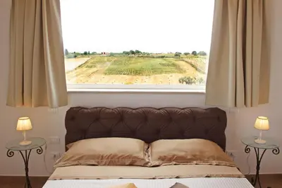 Letto o letti in una camera di Carrua