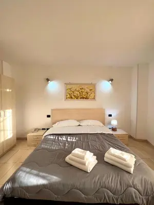 Letto o letti in una camera di Hotel Como
