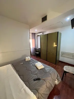 Letto o letti in una camera di Hotel Como