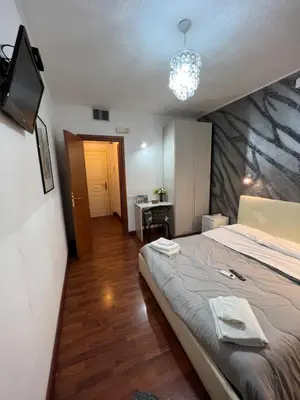 Letto o letti in una camera di Hotel Como