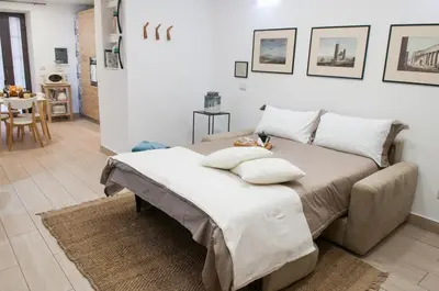 Letto o letti in una camera di Loft del Teatro