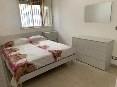 Letto o letti in una camera di Alexia