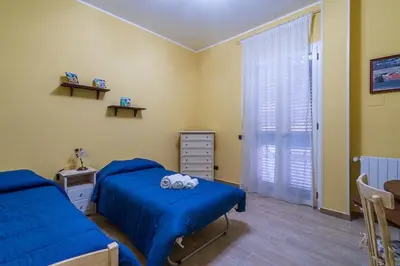 Letto o letti in una camera di Casa da Flo'
