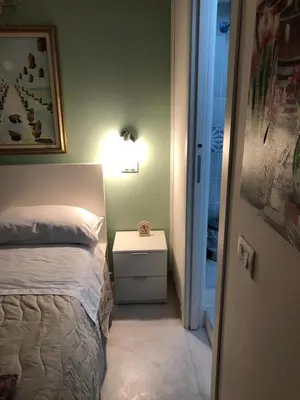 Letto o letti in una camera di Casa Cavour