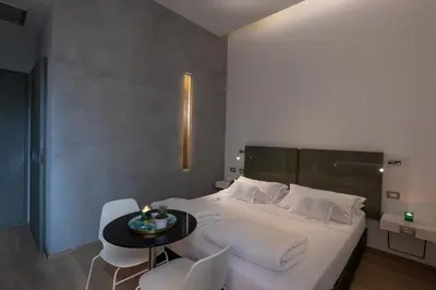 Letto o letti in una camera di UNA Hotels One Siracusa Wellness & SPA