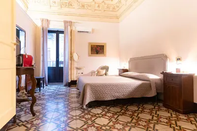 Letto o letti in una camera di Vera Rooms