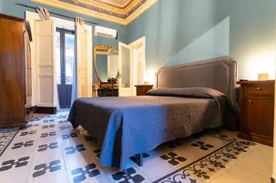Letto o letti in una camera di Vera Rooms