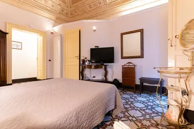 Letto o letti in una camera di Vera Rooms