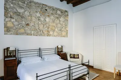 Letto o letti in una camera di B&B Palazzo Del Sale
