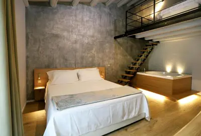 Letto o letti in una camera di ACANTO -Viaggio Barocco